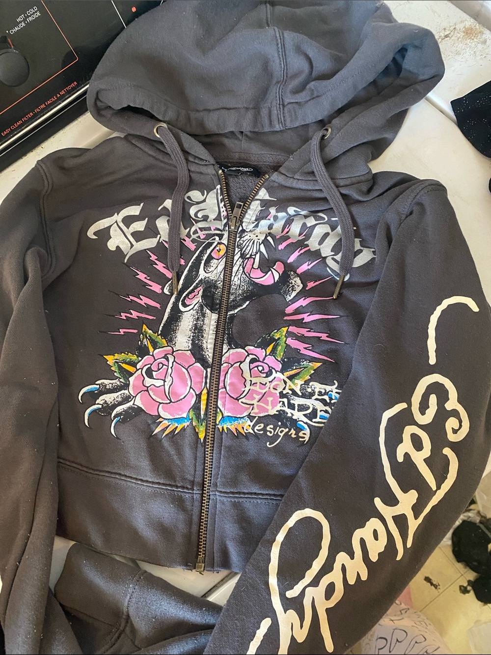 Women's Black Graphic Zip-Up Hoodie with Pink Floral Accents